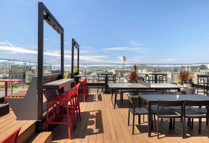 Infinity Hotel San Francisco, a Tapestry Collection by Hilton. Outdoor rooftop terrace seating with city views. Gay-friendly hotel.