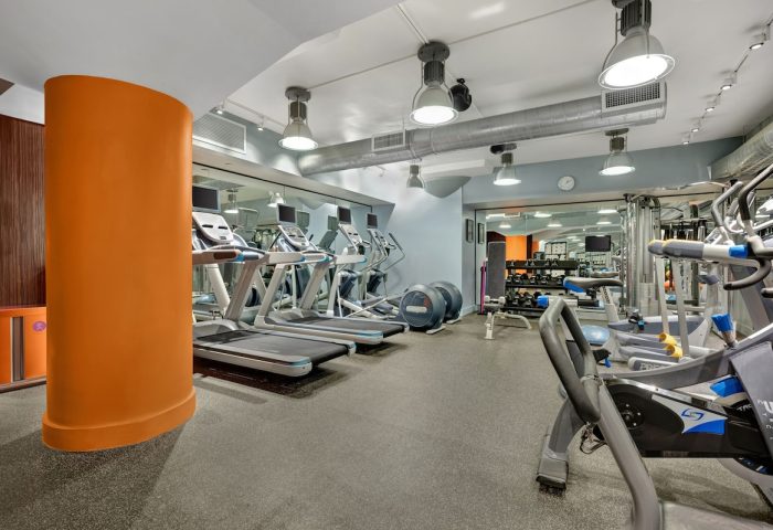 Ink 48 Hotel's gym. Gay-friendly hotel fitness center with treadmills, elliptical machines, weights, and exercise bikes for a complete workout.