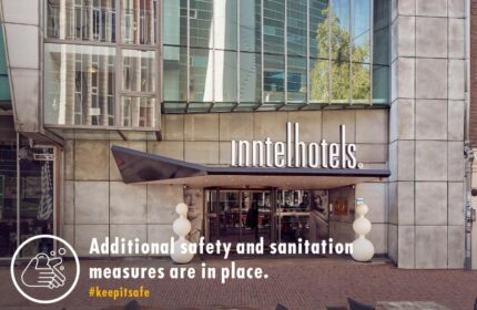 Inntel Hotels Amsterdam Centre entrance. Gay-friendly, pet-friendly hotel with safety measures. #keepitsafe. Amsterdam travel advice.