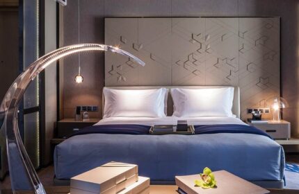 InterContinental Beijing Sanlitun gay-friendly hotel room. A modern bedroom with a large bed, stylish lighting, and contemporary decor, perfect for gay travelers.