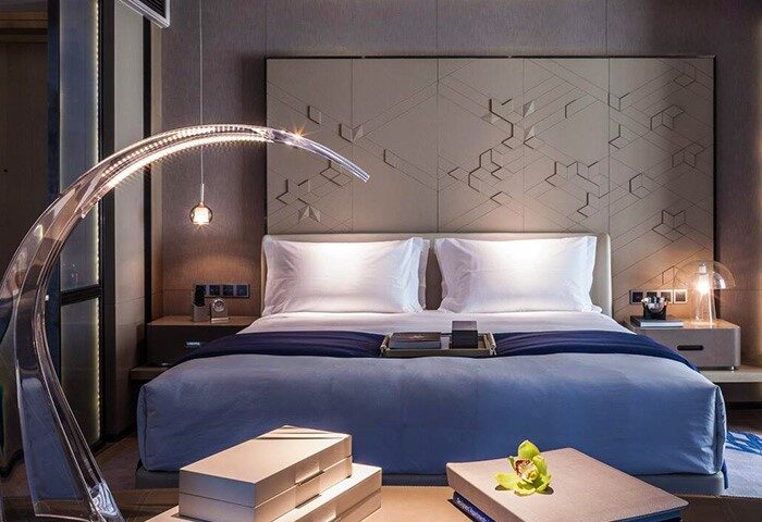 InterContinental Beijing Sanlitun gay-friendly hotel room. A modern bedroom with a large bed, stylish lighting, and contemporary decor, perfect for gay travelers.