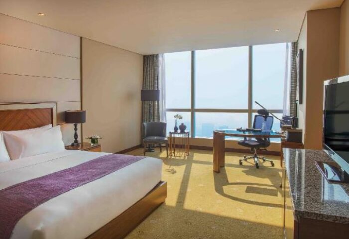 InterContinental Hanoi Landmark72 gay-friendly hotel room. Modern design, large windows, desk, and comfortable bed. Perfect for gay travelers.