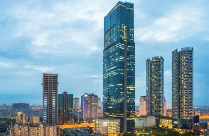 InterContinental Hanoi Landmark72, a gay-friendly hotel. Hanoi cityscape view at dusk. Modern architecture. Gay travel in Vietnam.