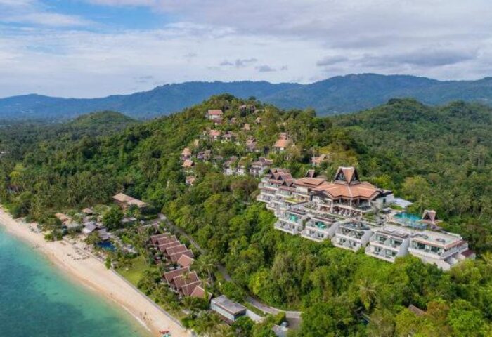 InterContinental Koh Samui Resort aerial view. Gay-friendly hotel with beach, pools, and lush greenery. Perfect for gay men's travel in Thailand.