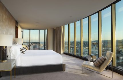 InterContinental San Francisco gay-friendly hotel room with city view. Modern design, large windows, and luxurious amenities. Perfect for gay travel.
