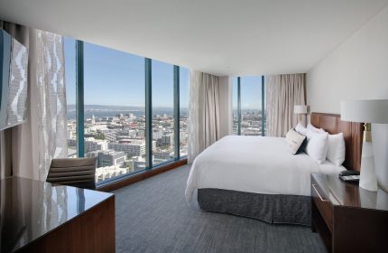 InterContinental San Francisco hotel room with city view. Gay-friendly hotel with modern design and floor-to-ceiling windows. Luxury travel for gay men.