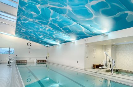 Indoor pool at the gay-friendly InterContinental San Francisco hotel. Ceiling with water effect, accessibility lift, and relaxing ambiance.
