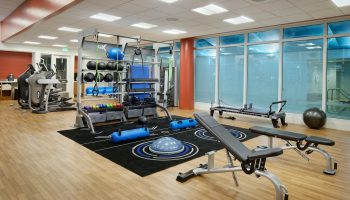 InterContinental San Francisco gay-friendly hotel gym. Exercise equipment, weights, and benches. Fitness center at a luxury hotel.