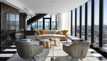 InterContinental San Francisco hotel suite. Modern living room with city view. Gay-friendly hotel interior design. Luxury travel.