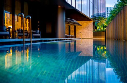 InterContinental Singapore Robertson Quay gay-friendly hotel's pool. Relax at this luxury Singapore hotel with great views and swim-up bar.