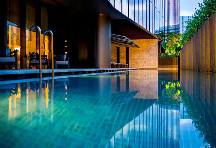 InterContinental Singapore Robertson Quay gay-friendly hotel's pool. Relax at this luxury Singapore hotel with great views and swim-up bar.