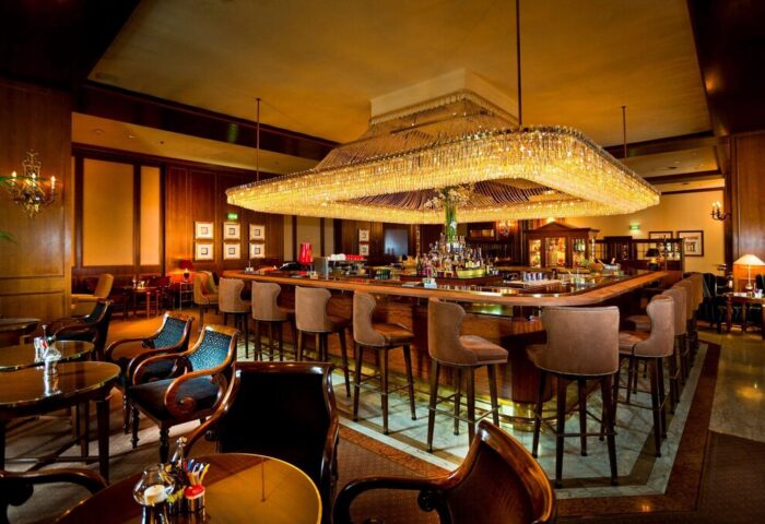 InterContinental Wien's bar. Gay-friendly hotel in Vienna, Austria. Stylish bar with a large chandelier. Perfect for gay men's travel.