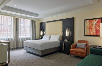 JW Marriott Chicago gay-friendly hotel room featuring a king bed, modern decor, and city views. Ideal for gay travelers seeking luxury.