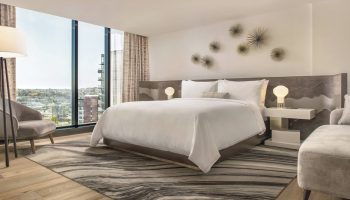 JW Marriott Parq Vancouver's gay-friendly hotel room. King bed, city view, modern decor. Ideal for gay travelers seeking luxury in Vancouver.