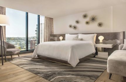 JW Marriott Parq Vancouver's gay-friendly hotel room. King bed, city view, modern decor. Ideal for gay travelers seeking luxury in Vancouver.