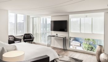 JW Marriott Parq Vancouver gay-friendly hotel room. Modern design, large windows, and city views. Ideal for gay travelers seeking luxury.
