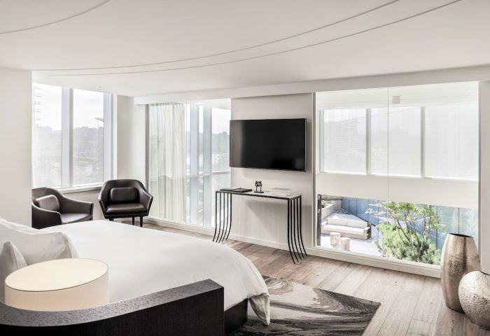 JW Marriott Parq Vancouver gay-friendly hotel room. Modern design, large windows, and city views. Ideal for gay travelers seeking luxury.
