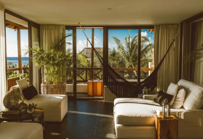 Jashita Hotel's gay-friendly suite: Hammock and lounge area with ocean view. Relaxing tropical getaway for gay men travelers.