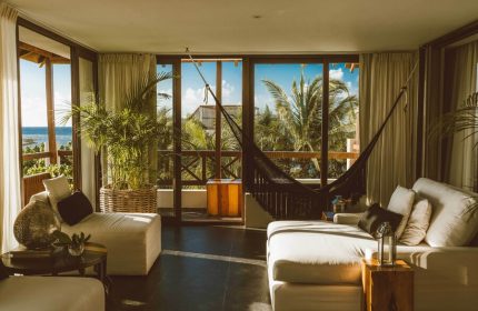 Jashita Hotel's gay-friendly suite: Hammock and lounge area with ocean view. Relaxing tropical getaway for gay men travelers.