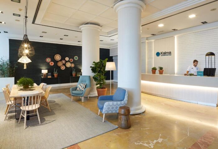Kalma Sitges Hotel lobby. Gay-friendly hotel features modern design, stylish furniture, and a welcoming reception area for gay travelers.