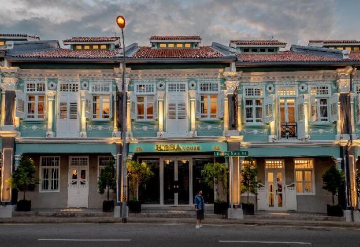 KēSa House, The Unlimited Collection by Oakwood, a gay-friendly hotel in Singapore. The building's facade is light blue with white trim.