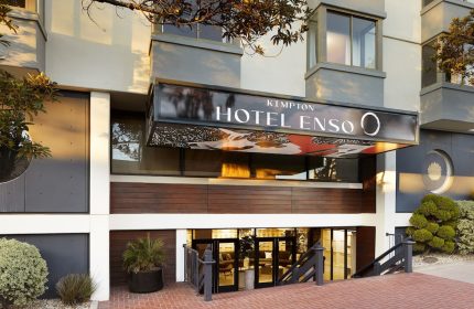 Kimpton Hotel Enso entrance. Gay-friendly hotel in San Francisco offering travel advice for gay men. Modern architecture, welcoming vibe.
