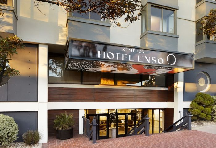 Kimpton Hotel Enso entrance. Gay-friendly hotel in San Francisco offering travel advice for gay men. Modern architecture, welcoming vibe.