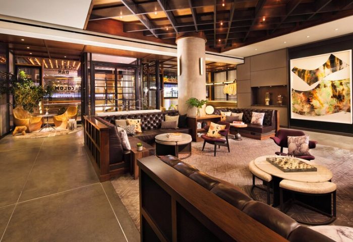 Kimpton Hotel Eventi's stylish lounge. This gay-friendly hotel features modern decor, leather seating, and a welcoming atmosphere for gay men travelers.