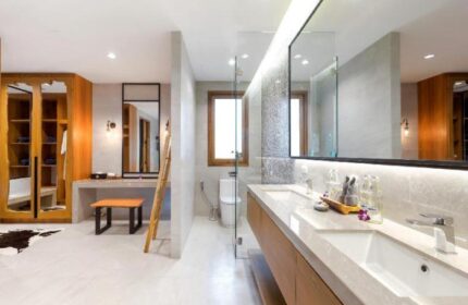 Krabi Resort Pool Villa bathroom. Gay-friendly hotel with modern design, double sinks, and ample storage. A luxurious space for a relaxing getaway.