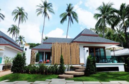 Krabi Resort Pool Villa: Gay-friendly hotel. Exterior view of a villa with a private pool, palm trees, and tropical landscaping.