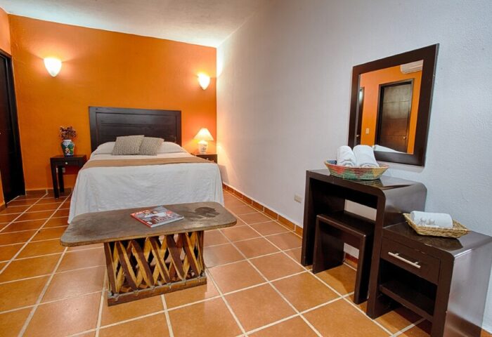 La Iguana Vallarta LGBT adults-only hotel room. Romantic Zone party clubbing street view. Gay-friendly hotel in Puerto Vallarta.