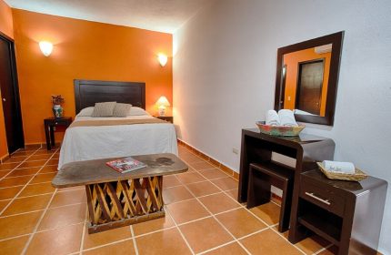La Iguana Vallarta LGBT adults-only hotel room. Romantic Zone party clubbing street view. Gay-friendly hotel in Puerto Vallarta.