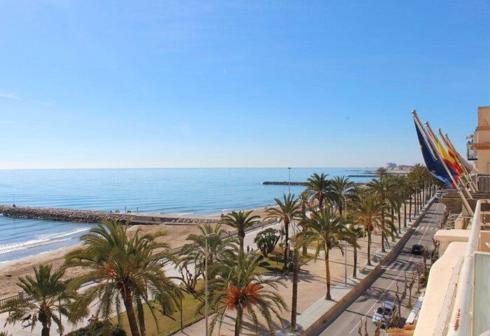 La Santa Maria gay-friendly hotel view. Beachfront hotel with palm trees, beach, and ocean views. A perfect gay travel destination.