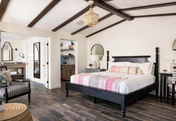 La Serena Villas, A Kirkwood Collection Hotel bedroom. Gay-friendly hotel with bed, bathroom, and kitchenette. Palm Springs travel.