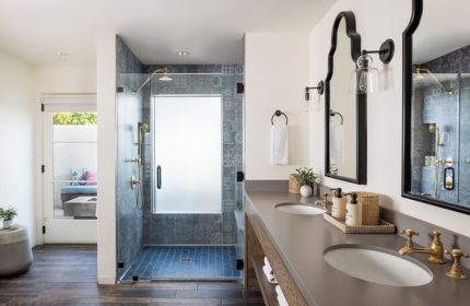 Bathroom at La Serena Villas, a gay-friendly hotel. Double sink, shower with patterned tile. A Kirkwood Collection Hotel for gay travel.
