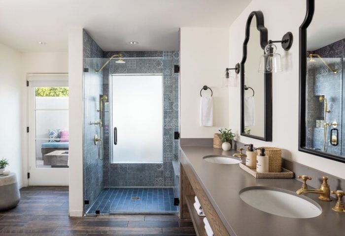 Bathroom at La Serena Villas, a gay-friendly hotel. Double sink, shower with patterned tile. A Kirkwood Collection Hotel for gay travel.
