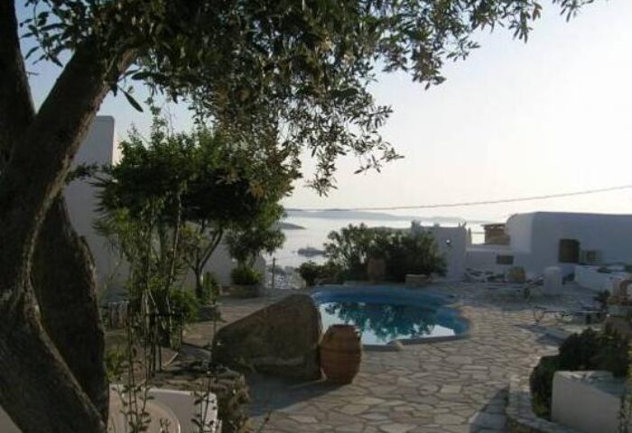 Pool view at La Veranda of Mykonos Traditional Guesthouse, a gay-friendly hotel. Relaxing Greek island escape.