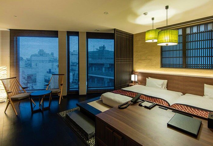 L'gent Hotel Shinjuku Kabukicho room. Gay-friendly hotel in Tokyo, Japan. Modern design with Japanese accents. Twin beds, city view.