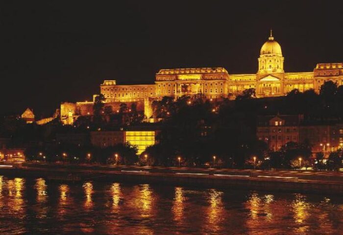 Night view of Budapest castle from Lánchíd 19 Design Hotel. Gay-friendly, pet-friendly hotel with city views.