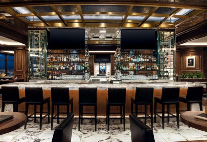 Bar at gay-friendly Las Vegas Hilton at Resorts World. Upscale design, marble floor, liquor selection, TVs. Perfect for gay travelers.