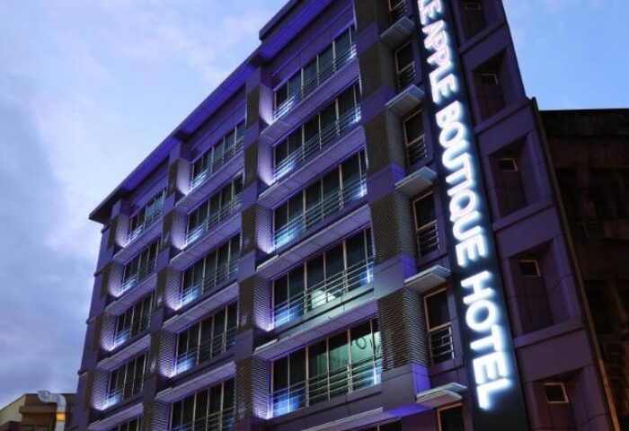 Le Apple Boutique Hotel Bukit Bintang exterior. Gay-friendly hotel in Kuala Lumpur, Malaysia. Modern architecture, illuminated signage.