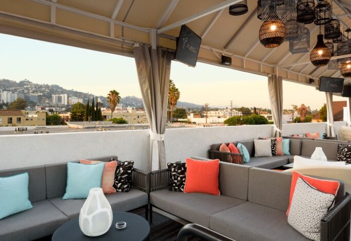 Le Parc at Melrose gay-friendly hotel rooftop lounge. Outdoor seating with city views. Modern design, perfect for gay travelers seeking style.