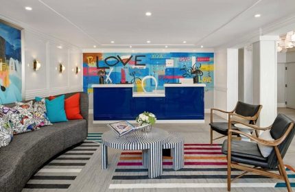 Le Parc at Melrose lobby. Gay-friendly hotel reception area with modern design, colorful art, and stylish furniture. Melrose gay travel.