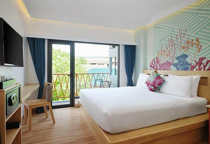 Lub D Koh Samui Chaweng Beach gay-friendly hotel room. Balcony view, modern design, double bed, desk. Ideal for gay travel in Thailand.