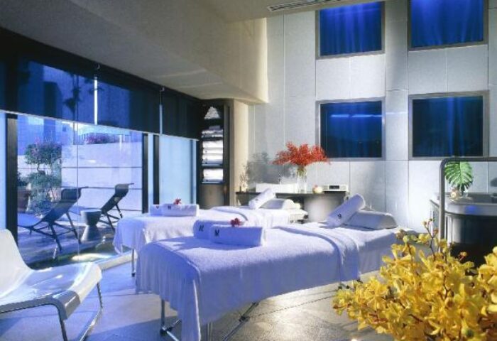 M Hotel's spa room with massage tables. Gay-friendly hotel features a luxurious spa for relaxation, perfect for gay men travelers.