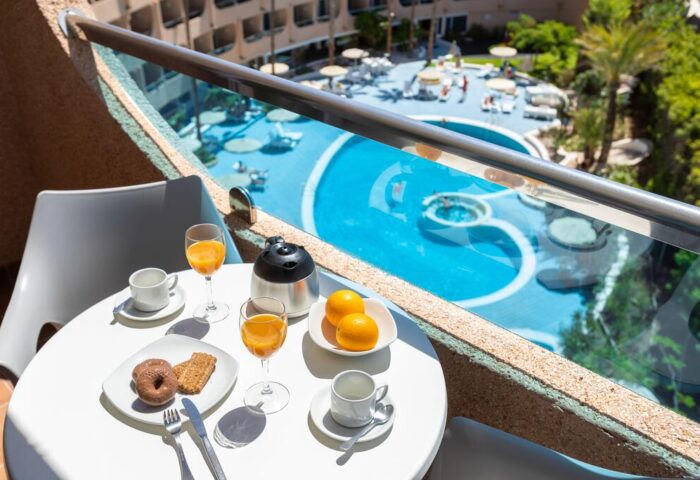 Breakfast with pool view at MUR Aparthotel Buenos Aires, a gay-friendly hotel in Gran Canaria. Perfect for gay men travel.