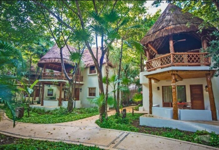 Mahekal Beach Front Resort and Spa: Gay-friendly hotel with thatched-roof bungalows in a lush, tropical setting. Ideal for gay men travel.