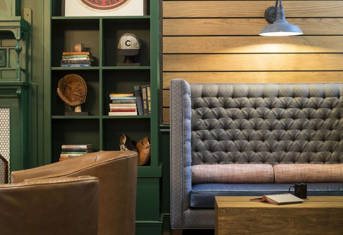 Gay-Friendly Majestic Hotel Chicago lounge area. Cozy seating, Cubs memorabilia, and stylish decor. A welcoming space for gay travelers.
