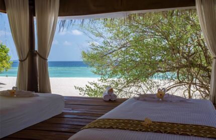 Malahini Kuda Bandos Resort's beach spa. A gay-friendly hotel, it offers a relaxing massage with ocean views. Perfect for gay travel.