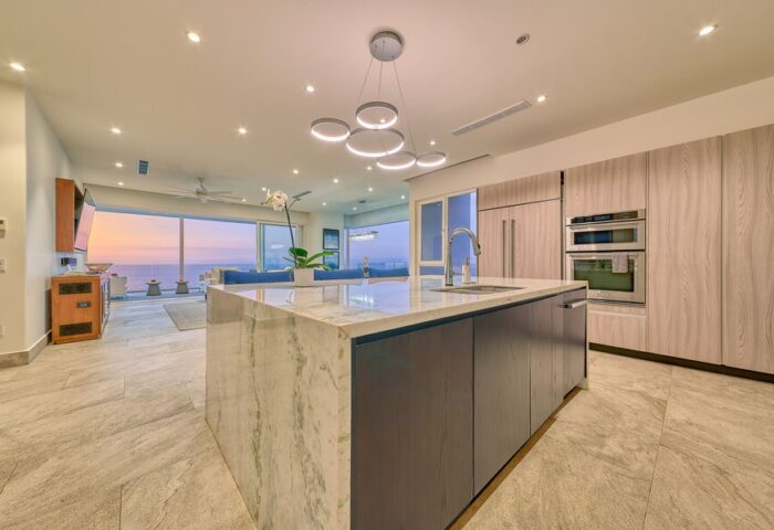 Maxwell Residences at Indah: Gay-friendly hotel kitchen island with ocean view. Luxury condo interior for gay travel.